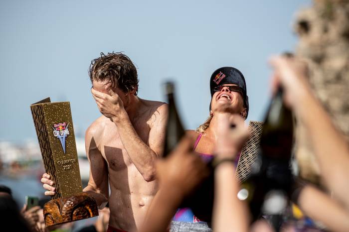 Gary Hunt (FRA) and Rhiannan Iffland (AUS) celebrate with the World Series King Kahakili trophies during the final competition day of the Red Bull Cliff Diving World Series at Polignano a Mare, Puglia, Italy on Sep. 26, 2021; (photo: Dean Treml, Red Bull Content Pool)
