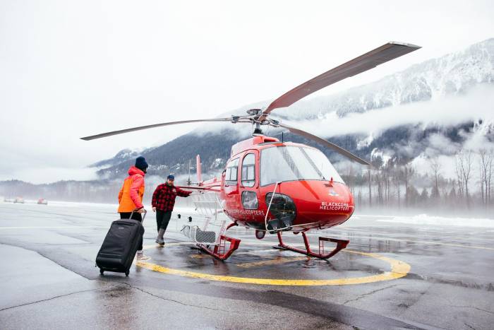 tatum monod walks to helicopter for adventure