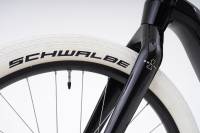 Gold & Leather E-Bike: Serial 1 Unveils Highly Exclusive MOSH/TRIBUTE tire detail near the fork on the Serial 1 S1 Mosh/Tribute e-bike