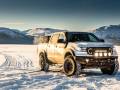The Best Snow Tires of 2021-2022 Pickup truck with snow tires driving on snow