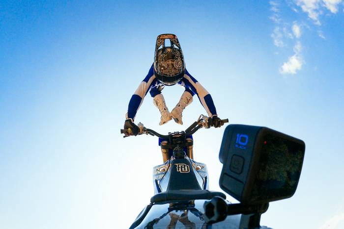 Moto rider back flipping with GoPro Hero10 Black