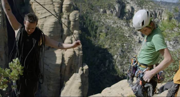 lor sabourin racking up with a friend who is flaking a climbing rope