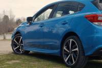 Subaru Recalls 2021 Imprezas: Owners ‘Instructed Not to Drive’ side view of a 2021 Subaru Impreza in blue