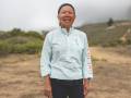 'Women in Adventure': Garmin Spotlights Marathon Record Runner Chau Smith chau smith runner in a HOKA ONE ONE trail run jacket and headband smiling
