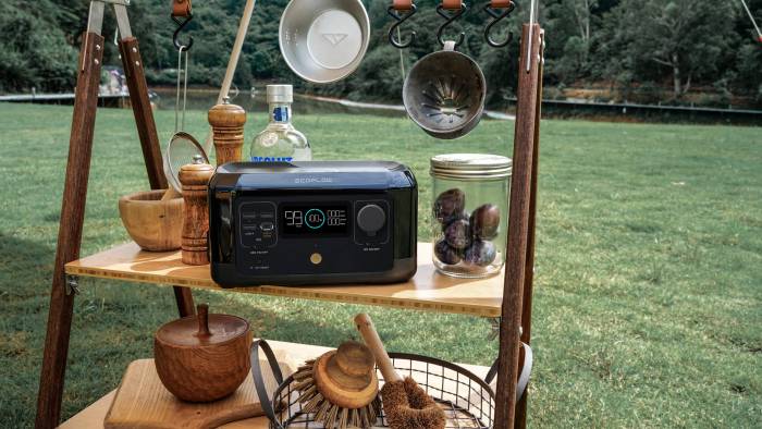 EcoFlow River Mini sitting on a table with other trinkets