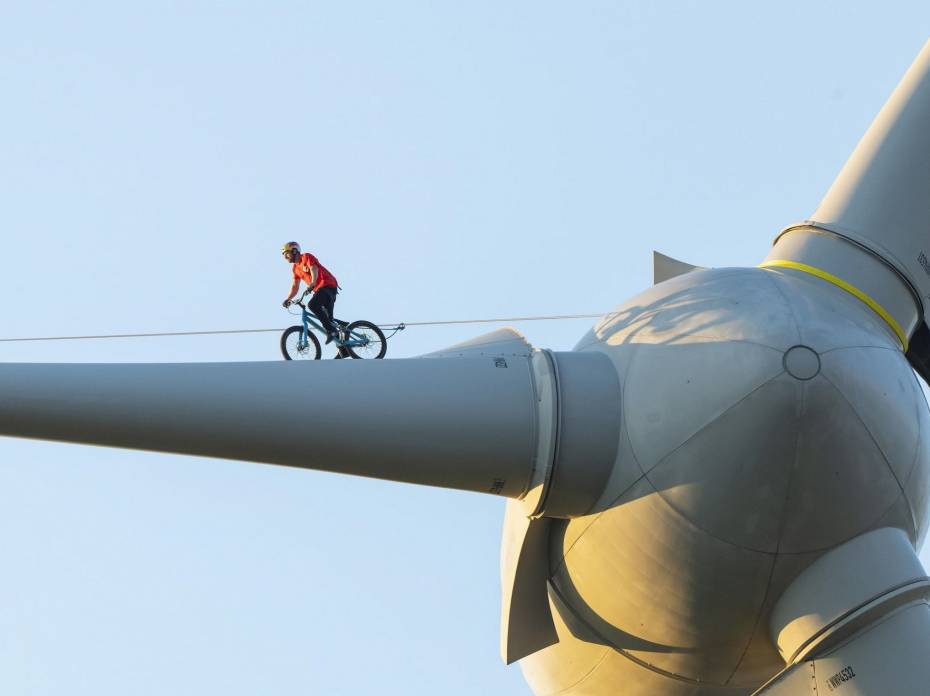 Danny MacAskill Debunks Climate Change Myths One Trick at a Time Danny MacAskill on a wind turbine in the mtb-stunt film 'Climate Games'.