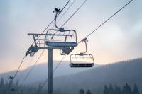 16 Ski Resorts Opening This Week: Where to Ski in the West and East a view of a chairlift in the early morning at Eldora Mountain in Colorado in Octobe