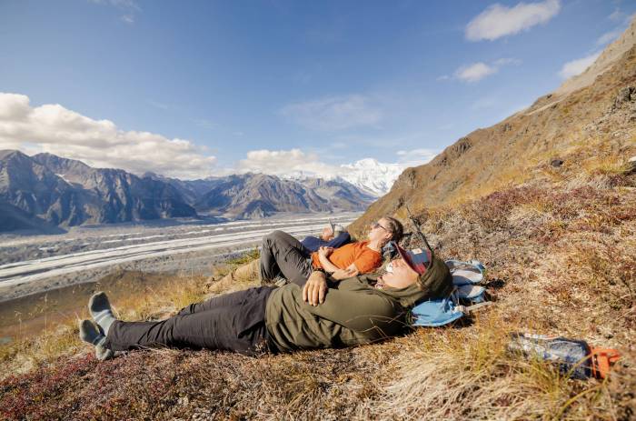 two hikers outside relaxing