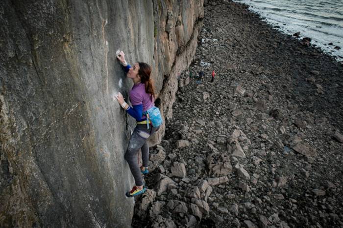Emma Twyford climbing Big Bang at Lower Pen Trwyn in North Wales. First ascended by Neil Carson in 1996, this was the first 9a to be established in Great Britain. Twyford is now the first British woman to climb 9a Photo by John Bunney