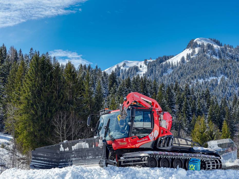 After 33 Years, Grand Targhee Cat Skiing Makes Way for Lift Access a red snowcat on a clear day