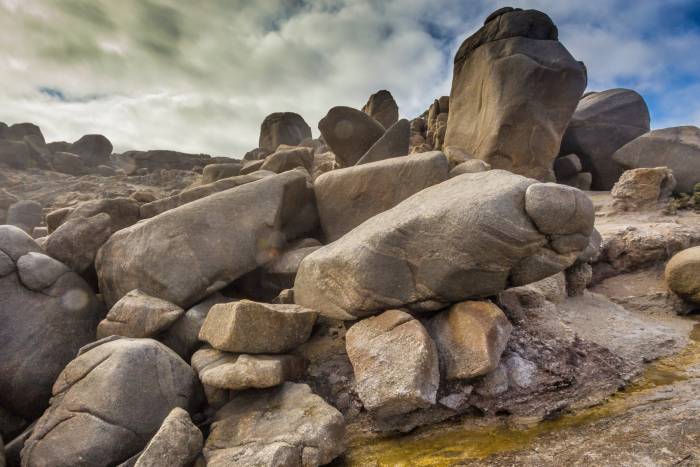 Three granite boulders like those seen here will be shipped to a Calgary park; (photo/Philip Schubert)