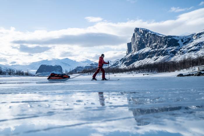 Ewa Kalisiewicz ski touring with a sled across the Arctic Circle