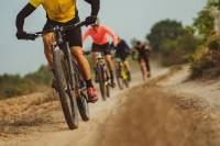 Watch How a Mountain Bike Race Funds Tanzania Community Development Group of mountain bikers