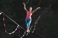 Watch Lycra-Clad Slackliners Style It in '80s-Style Montage Watch Lycra-Clad Slackliners Style It in '80s-Style Montage
