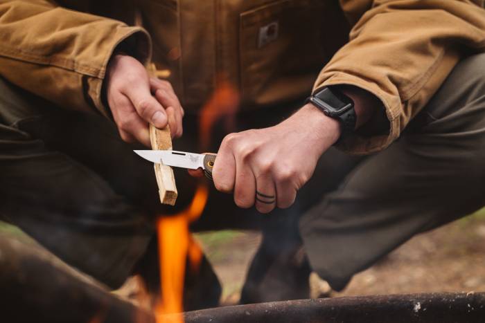 benchamde weekender knife over campfire