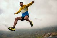 'Eat Vert': Attend the First-Ever Brooks Trail Summit Running Festival (It's Free!) man jumping in brooks running shoes