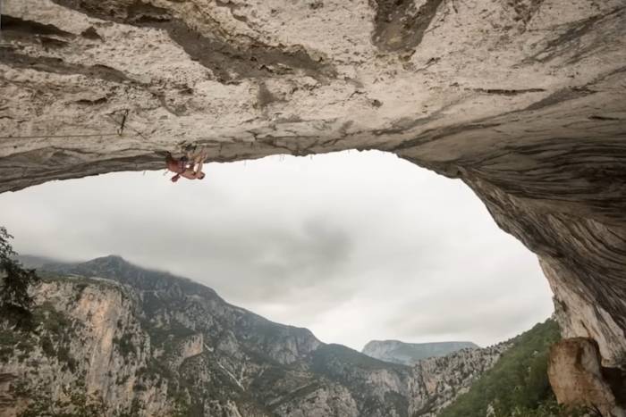 Seb Bouin on DNA 5.15d, screenshot from Climbers Crag, YouTube