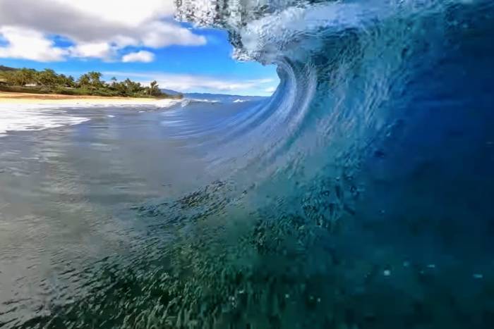 GoPro surfboard shot by Mason Ho from inside a wave