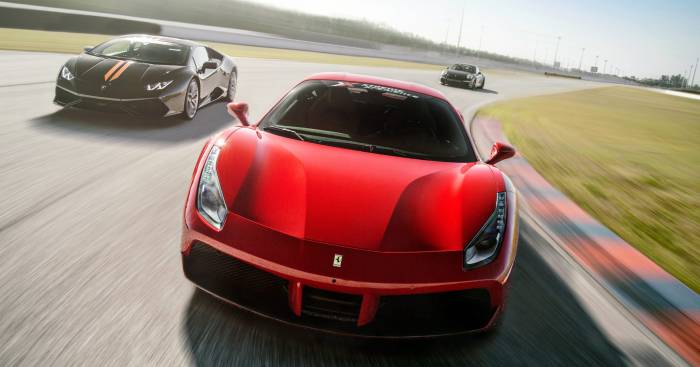 front view of Ferrari driving on race track