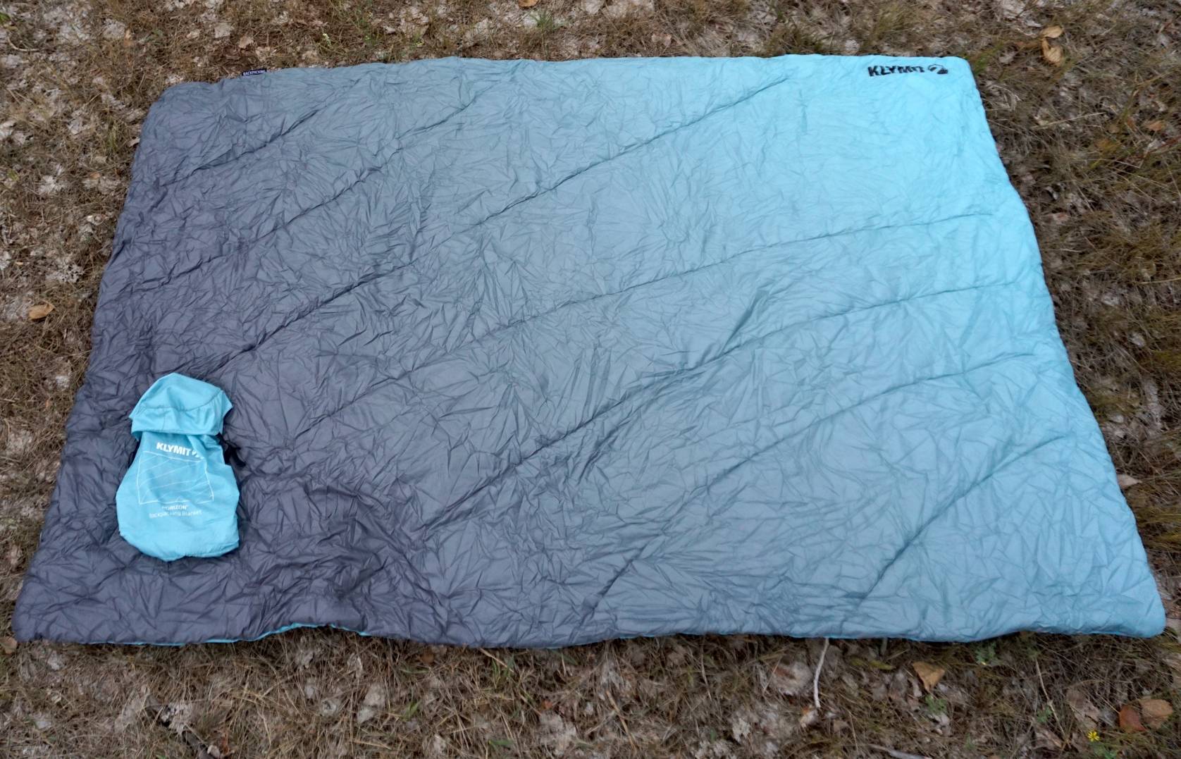 thumbnail image 2 of Klymit Horizon Packable Camping Blanket | PrimaLoft Insulation, Water-Resistant | 58" X 80" | Blue/Black 2 of 13