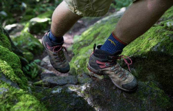 darn tough socks in boots while hiking.