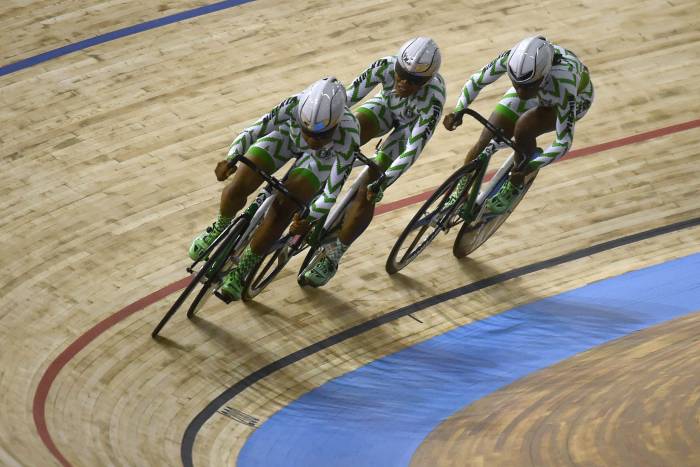 Nigerian team's members Tawakalt Yekeen, Mary Samuel and Ese Ukpeseraye compete in the women's Team Sprint first round during the UCI Track Cycling World Championships at Jean-Stablinski velodrome in Roubaix, northern France, on October 20, 2021.