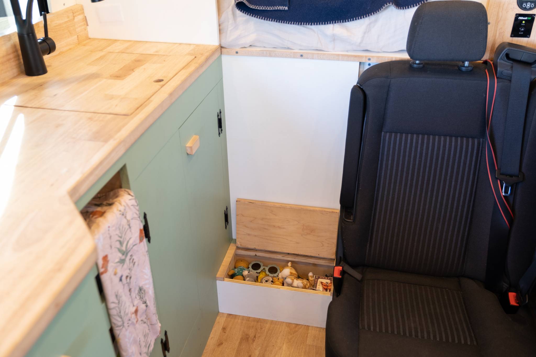 Toy Box and Step in a Converted Campervan Vanlife With A Kid