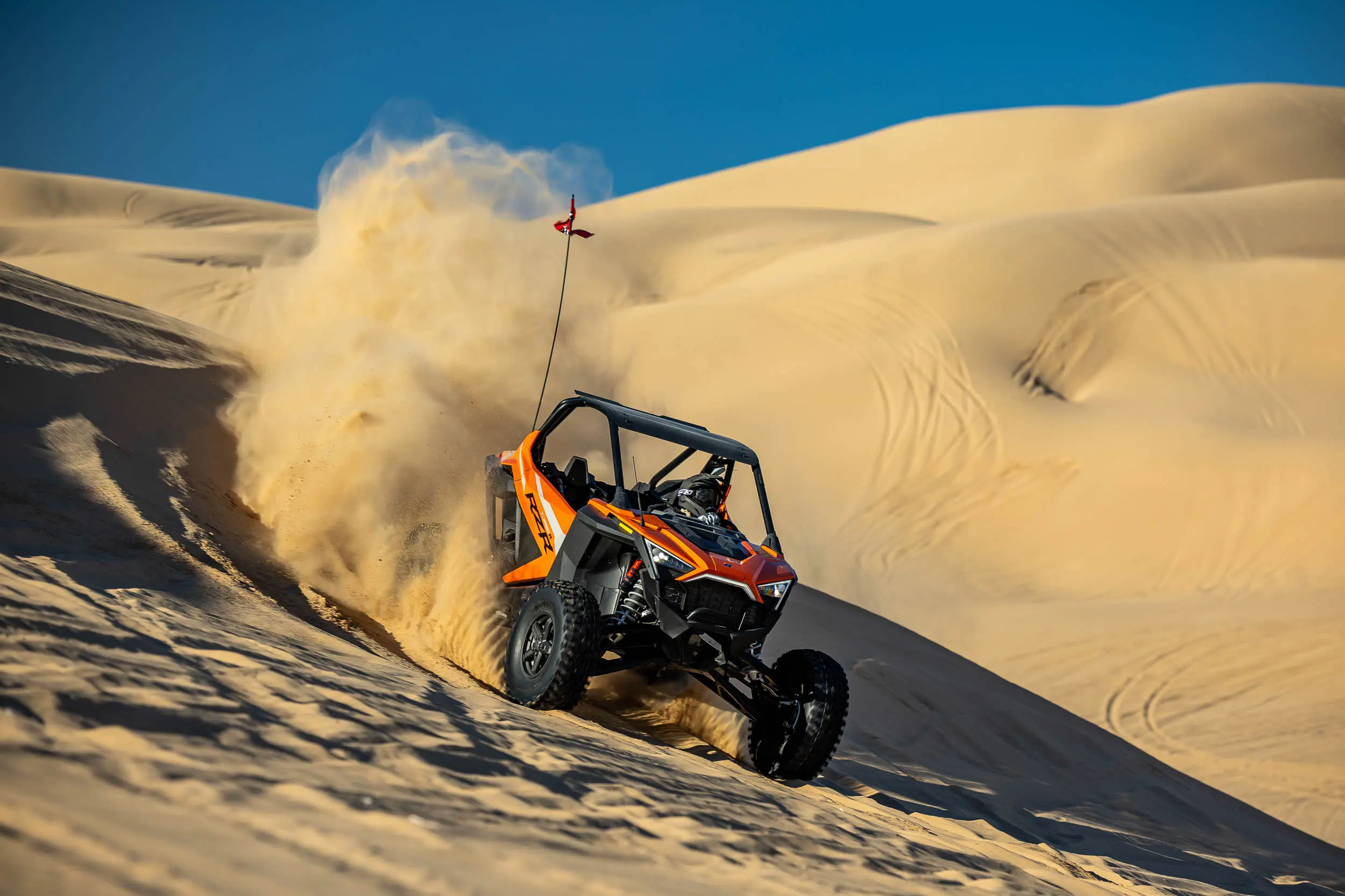 2023_polaris_rzr_turbo_r__GM_3501 2023 Polaris RZR Turbo R driving on a sand dune