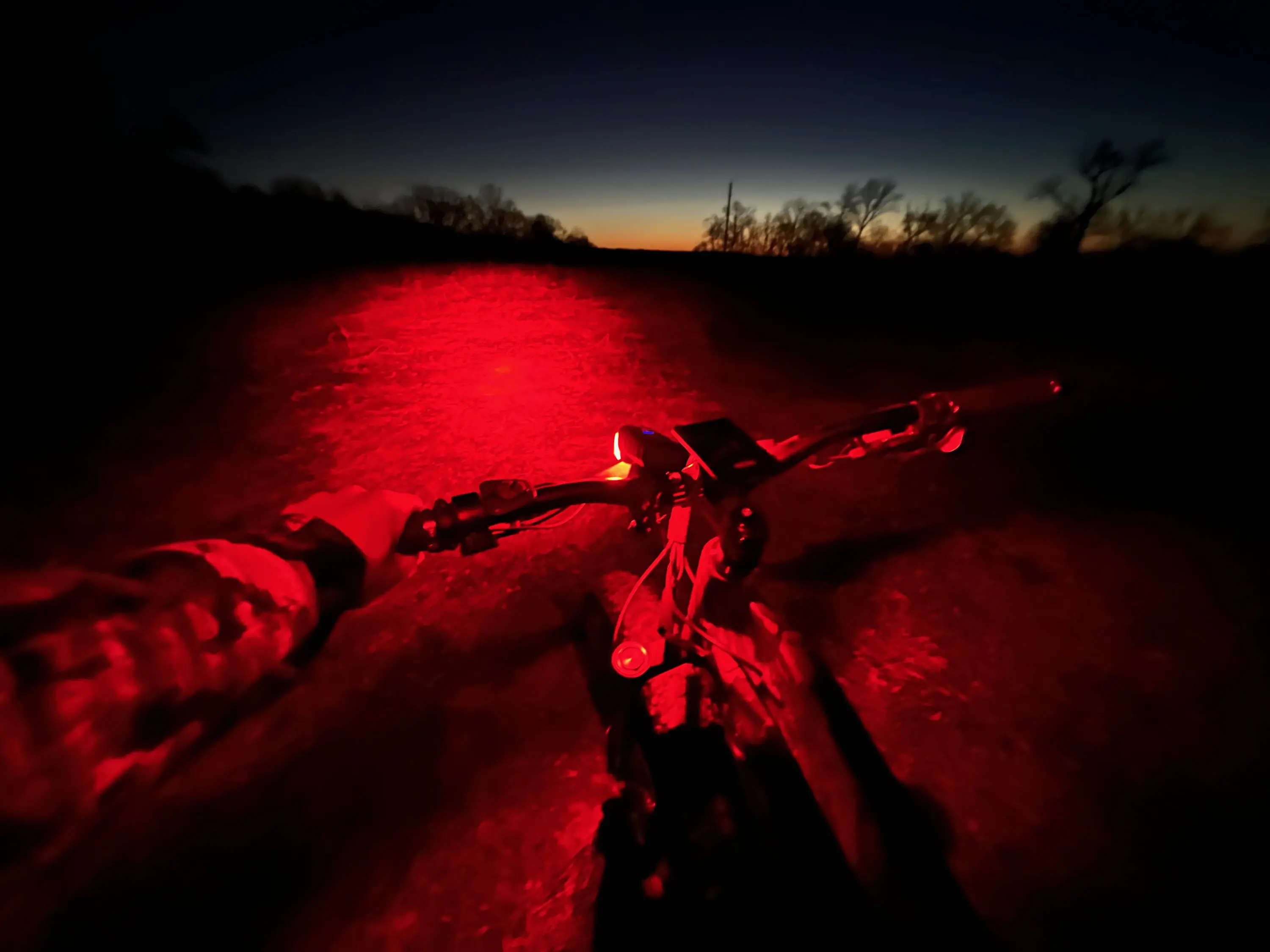 QuietKat e-bike light lighting road red at sunrise