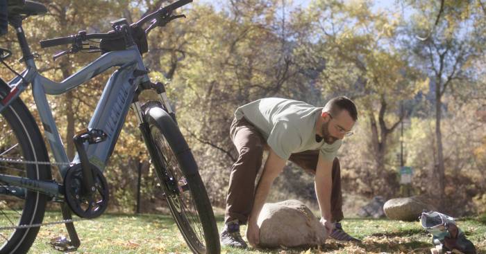 Cam Maier lifting a 250 pound stone