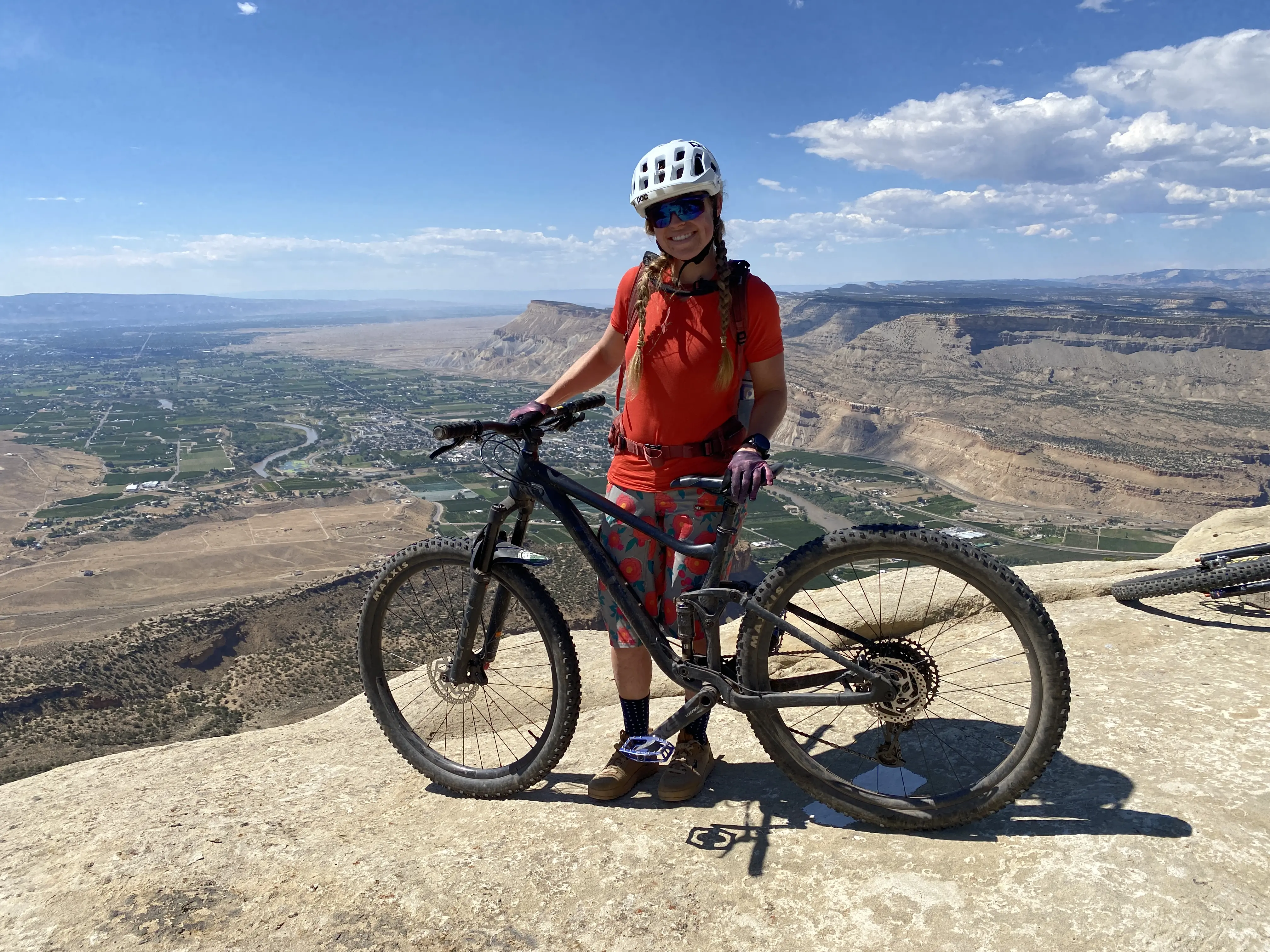 Woman standing with the Liv Embolden 1 Woman standing with Liv Embolden 1
