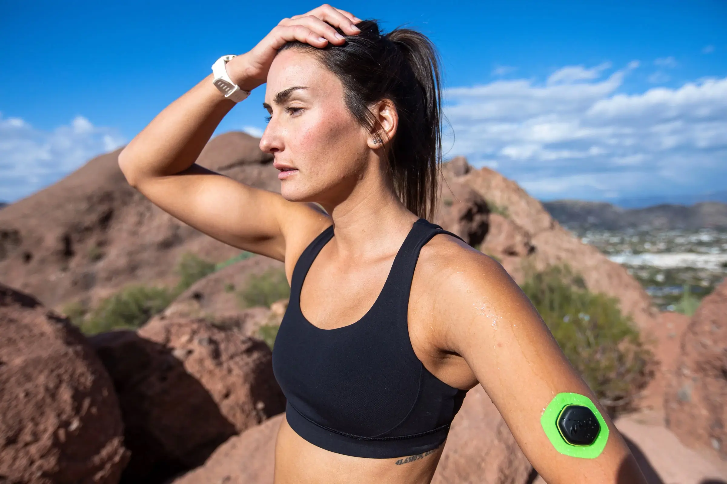 NIX Hydration Biosensor worn on runner's arm