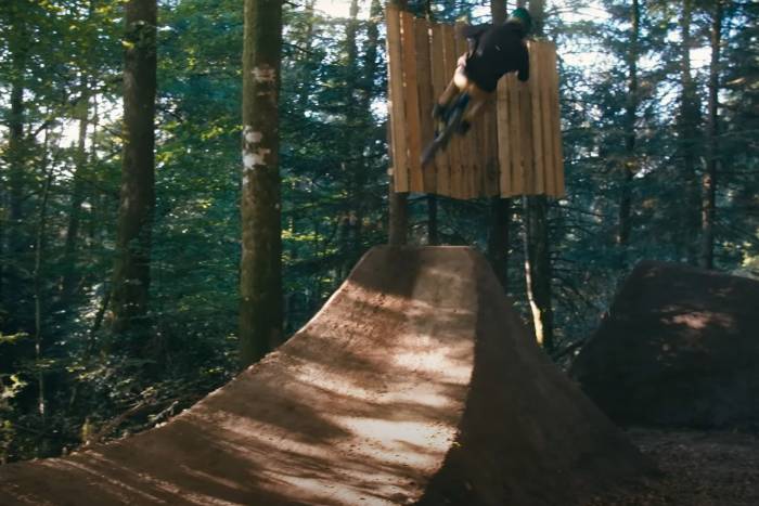 Eliott Lapotre gets some air on a homemade bike feature.