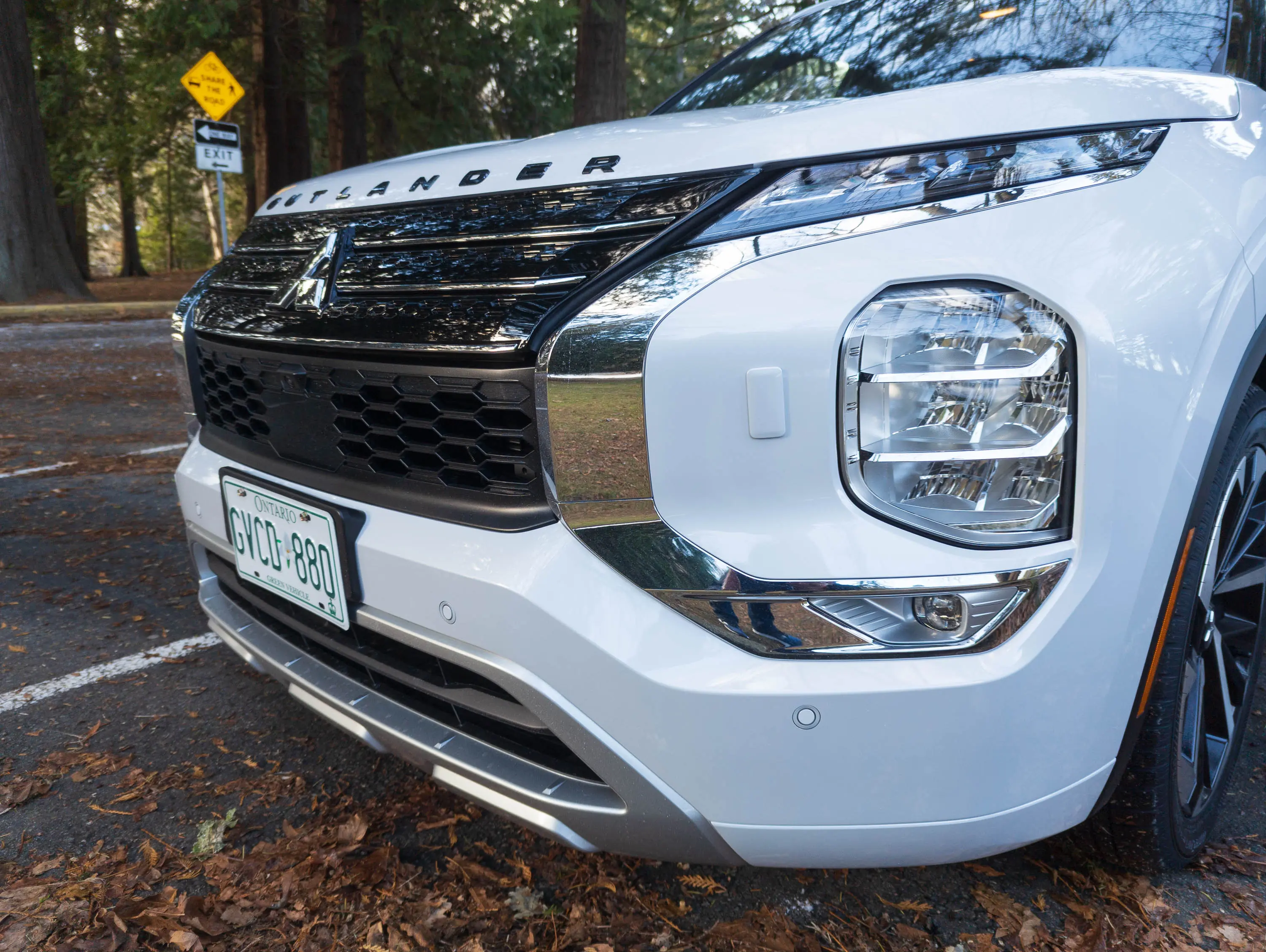 2023 Mitsubishi Outlander PHEV Review 2023 Mitsubishi Outlander PHEV Review front three-quarter close up of grille