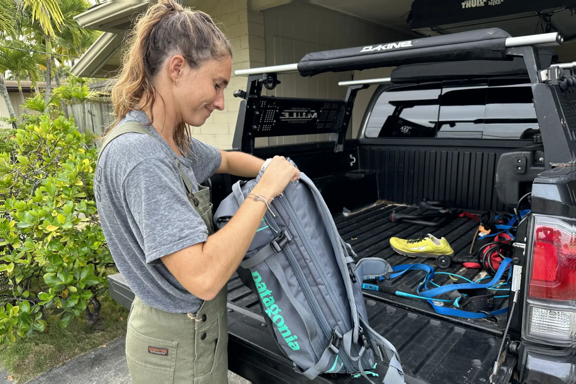 Packing up some gear into the Patagonia Black Hole MLC 45L Travel Pack.