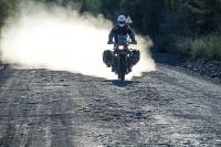 Motorcycle Suspension: A Complete Guide for Adventure Touring how to tune Motorcycle Suspension motorcycle and rider on dirt road