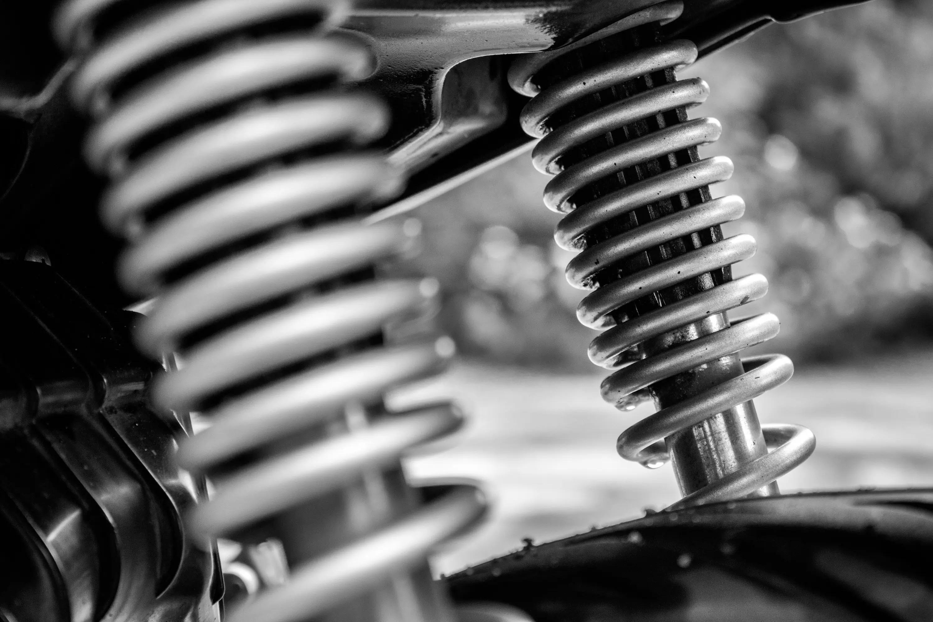 how to tune your Motorcycle Suspension how to tune your Motorcycle Suspension close-up of shocks and springs