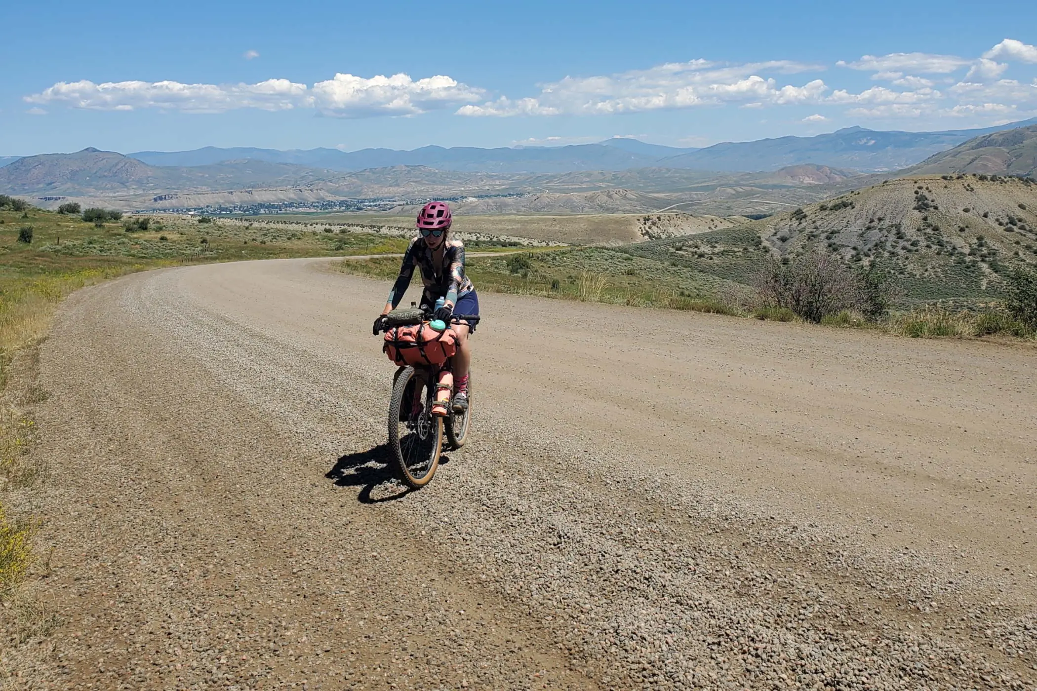 Swift industries zeitgeist pack on bike being ridden by author on gravel road