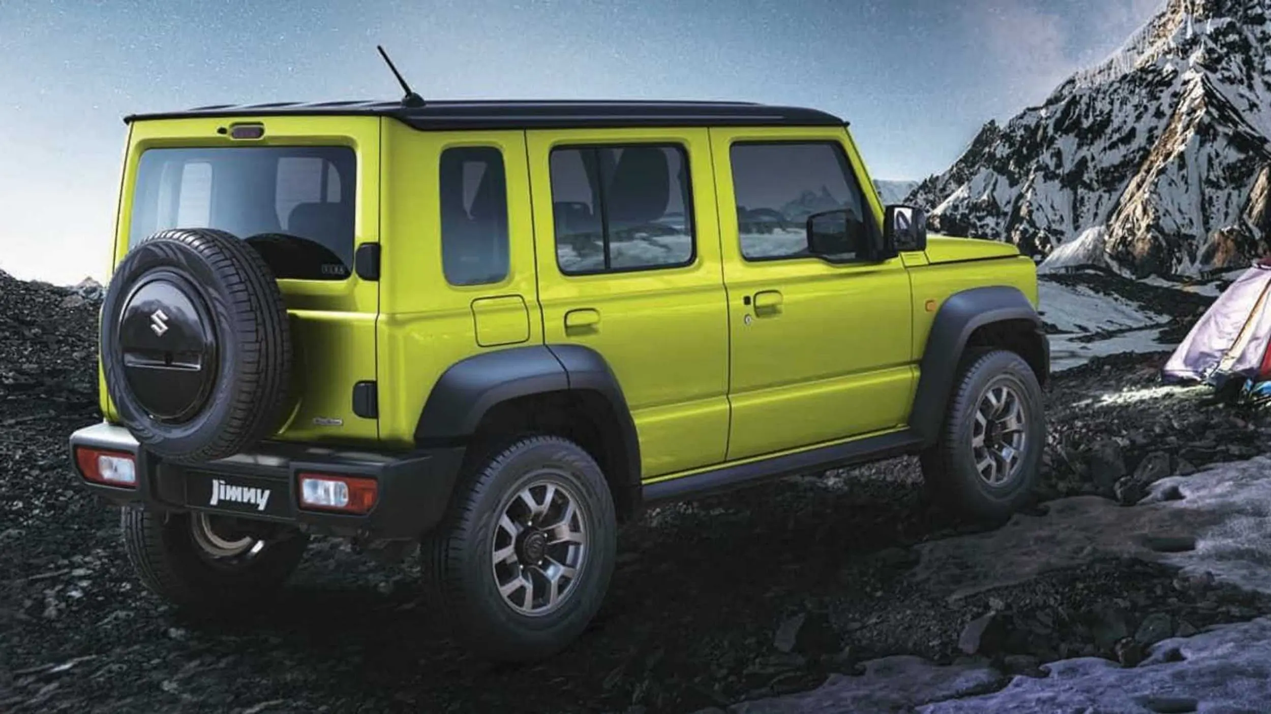 2023 Suzuki Jimny rear three-quarter off-road.