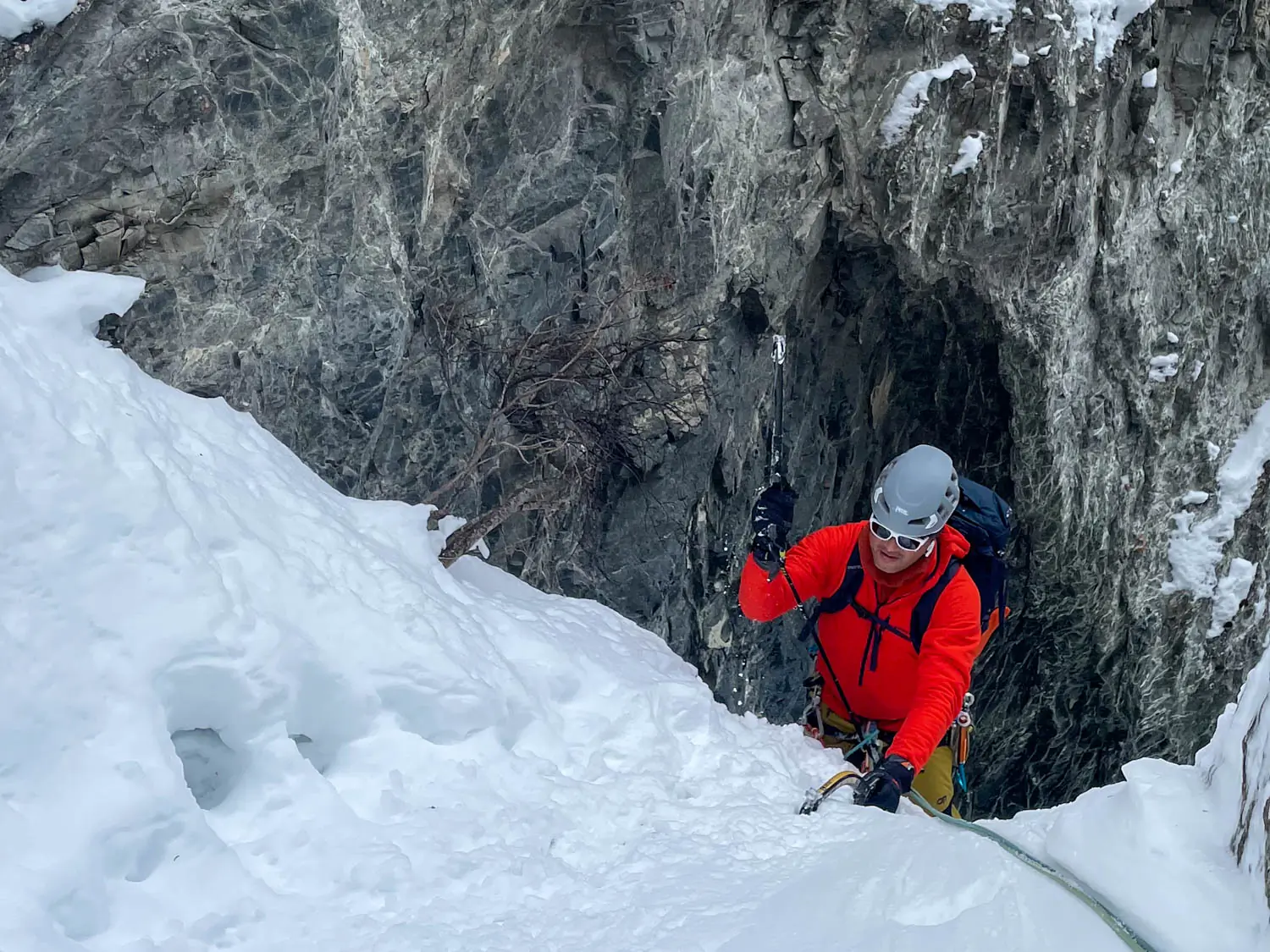 The author climbing to the first belay with Grivel Dark Machine ice tools
