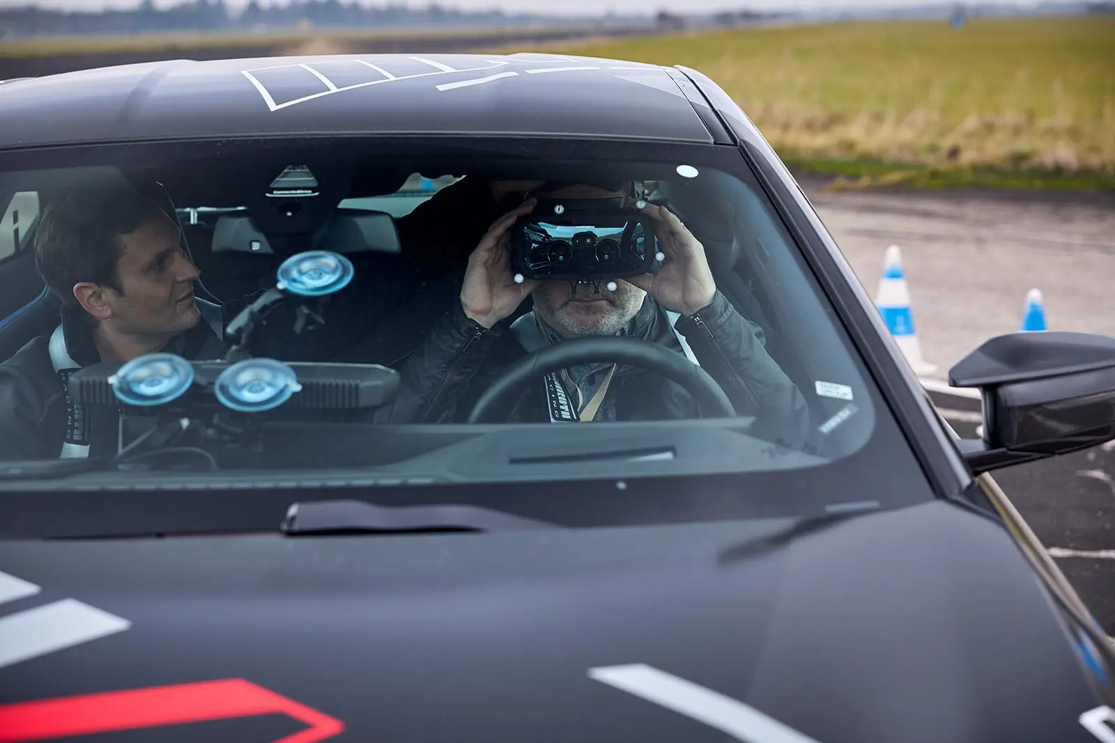 M Mixed Reality Drive - Paul putting on goggles BMW M Mixed Reality