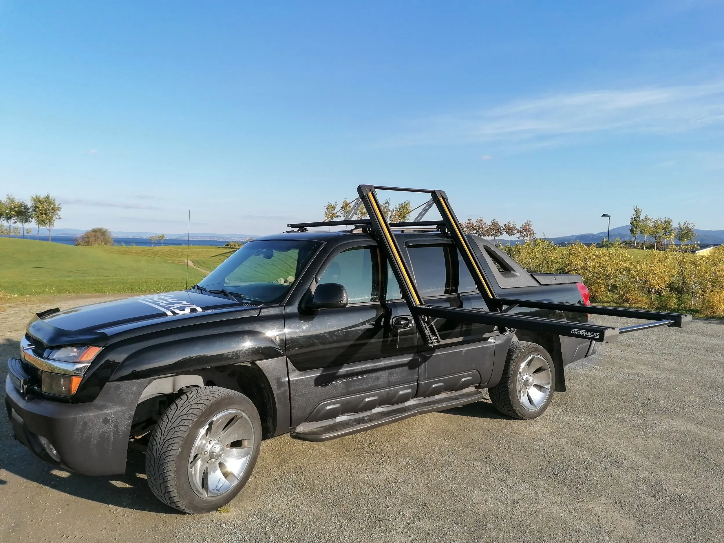 Dropracks Lowering Roof Rack installed and lowered on truck