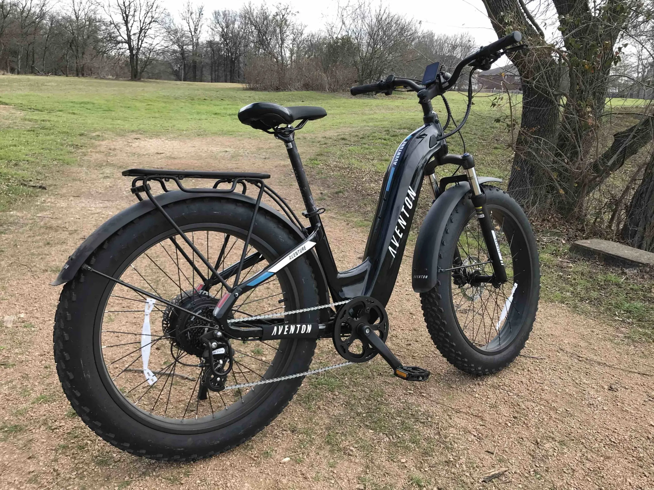 Aventon Aventure 2 e-bike on a gravel path.