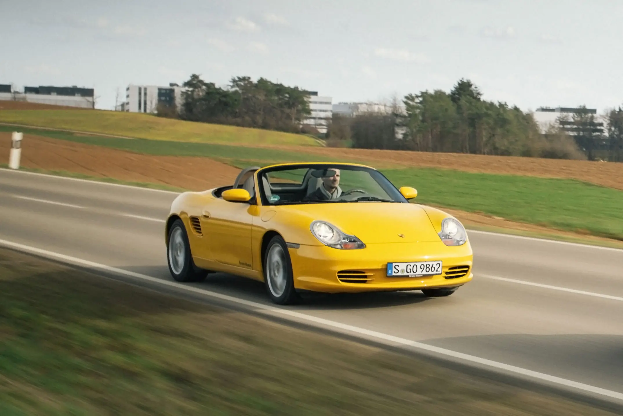 yellow 1999 porsche boxster s