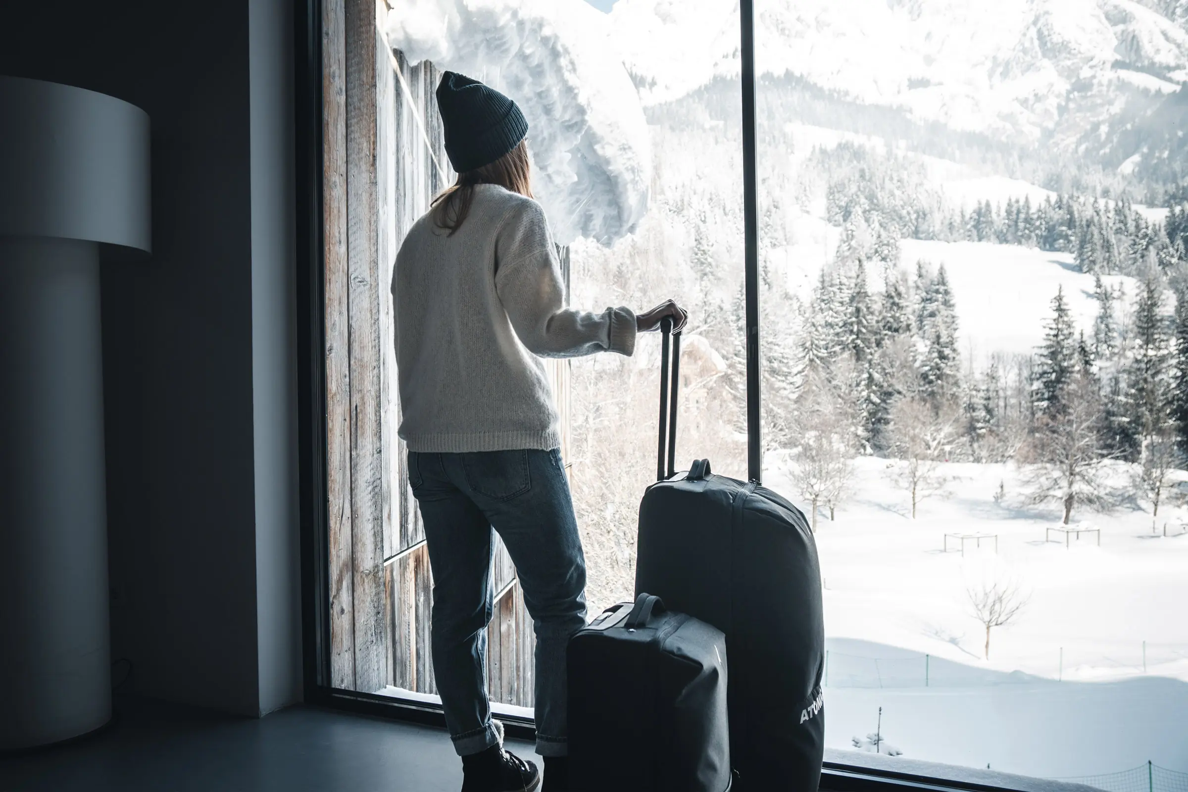 Atomic 2023 Environmental Statement skier looking at winter landscape