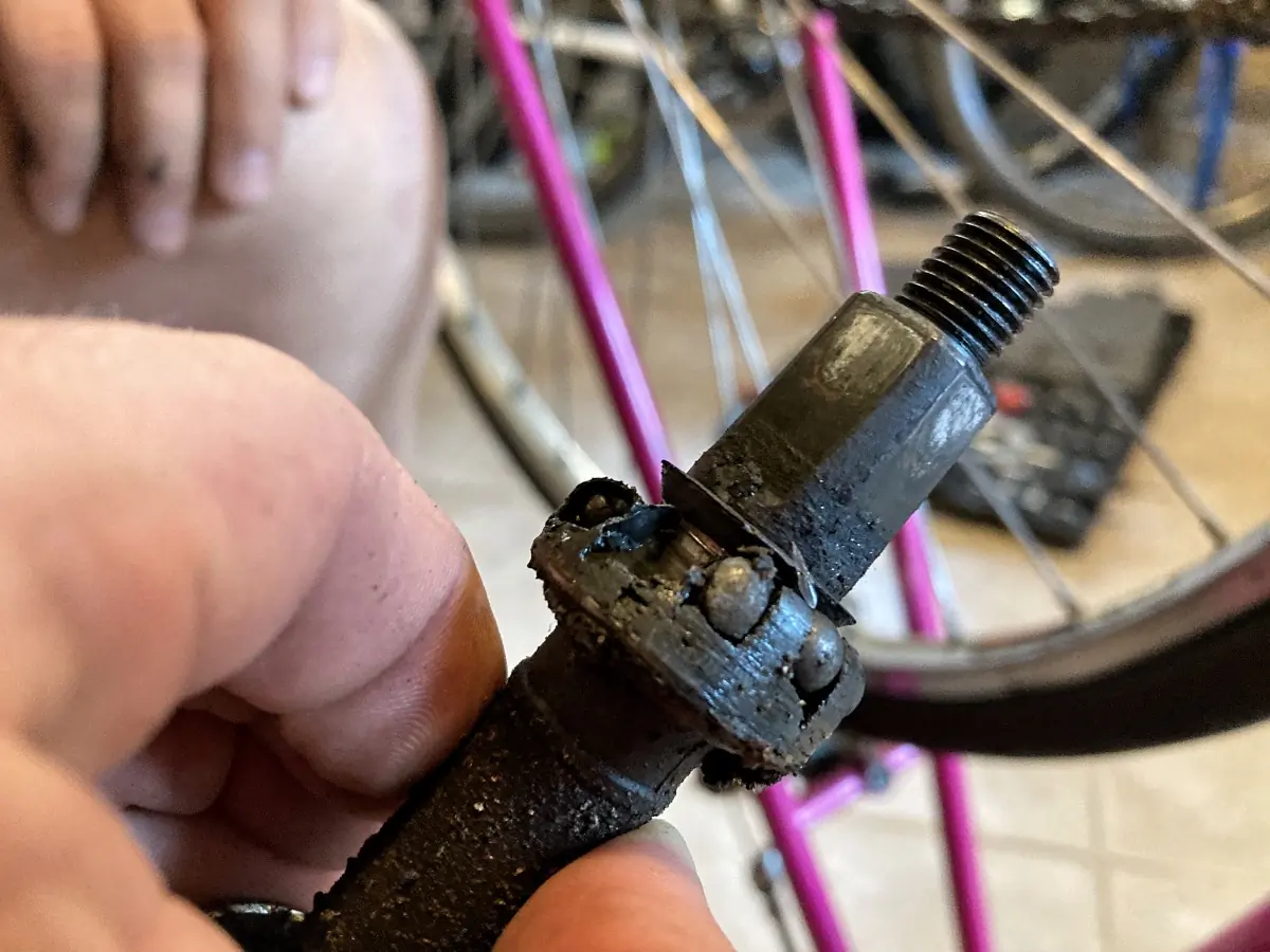 a worn out bottom bracket spindle