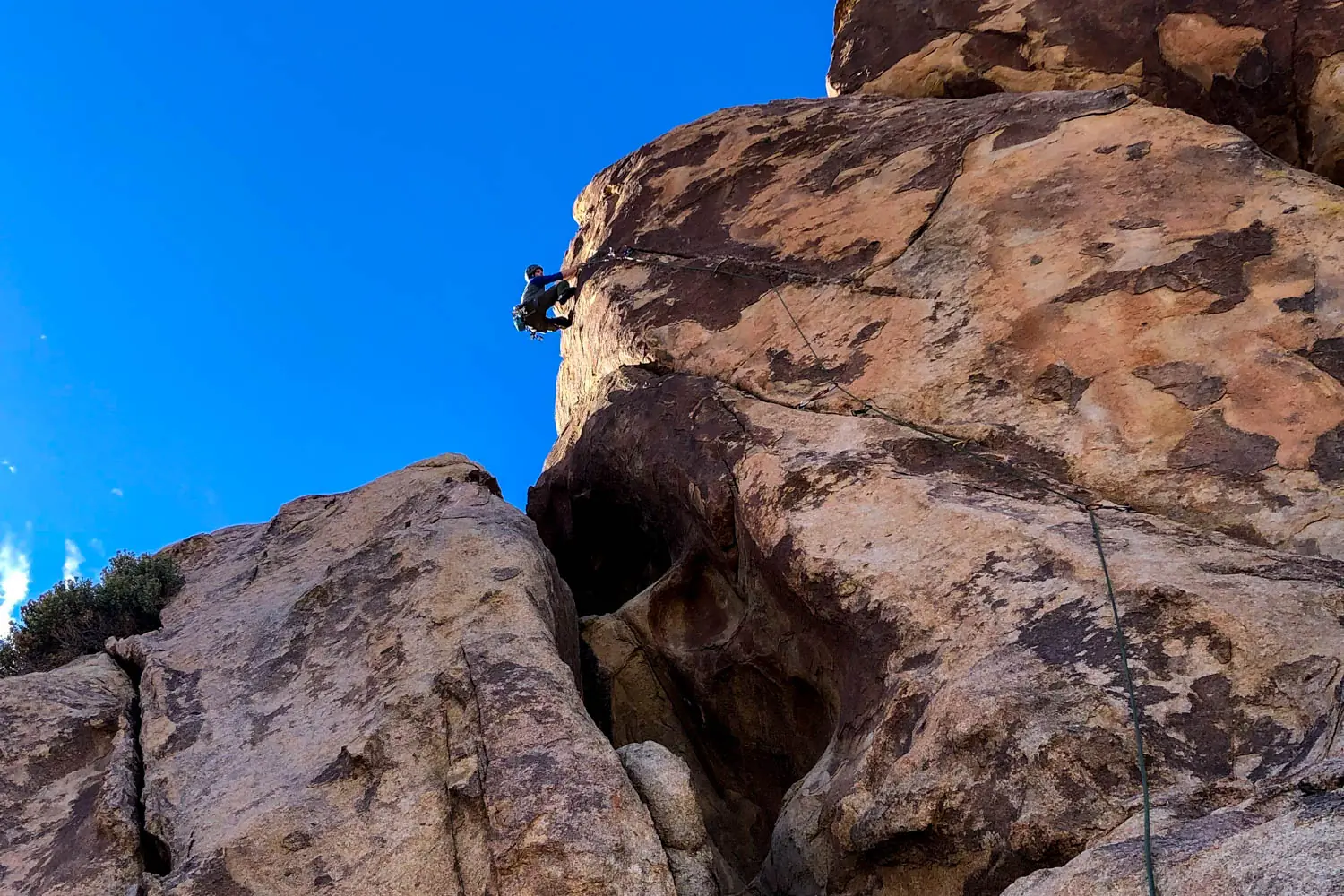 A climber in Joshua Tree National Park, a standout trad climbing area