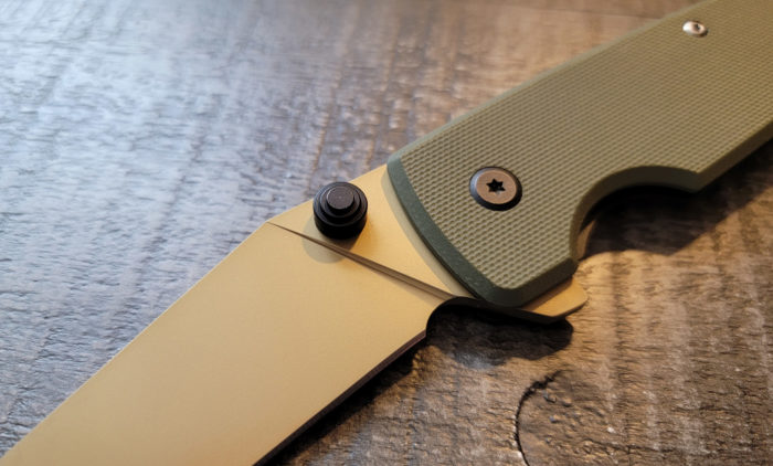 Ontario Epoch Knife thumb studs closeup