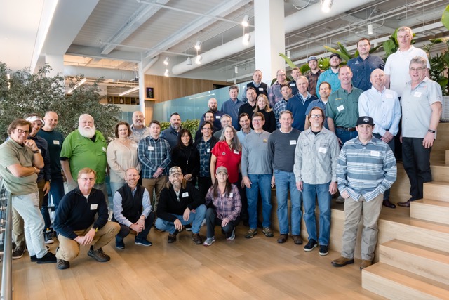Brand members and participants gather for a photo at the Paddlesports Summit