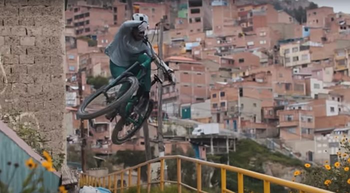 Kilian Bron rides a bike in an urban setting